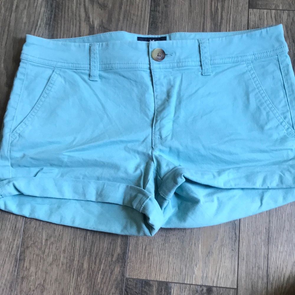 Teal American Eagle midi shorts.